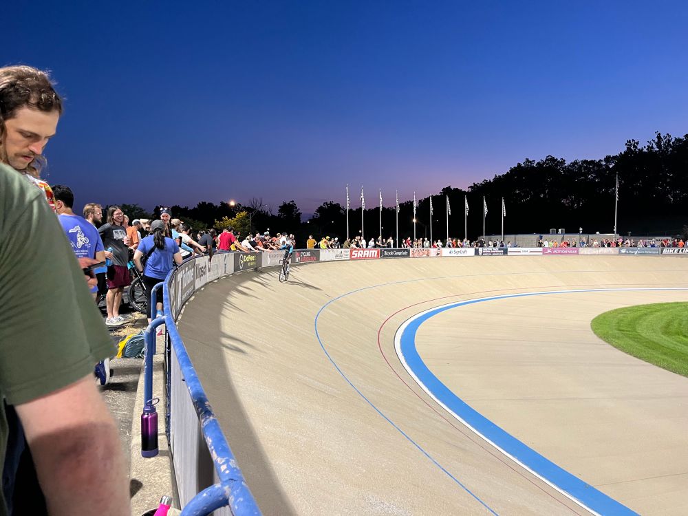 Richard, an Indianapolis Local runs a parade lap high fiving spectators at the Velodrome 
