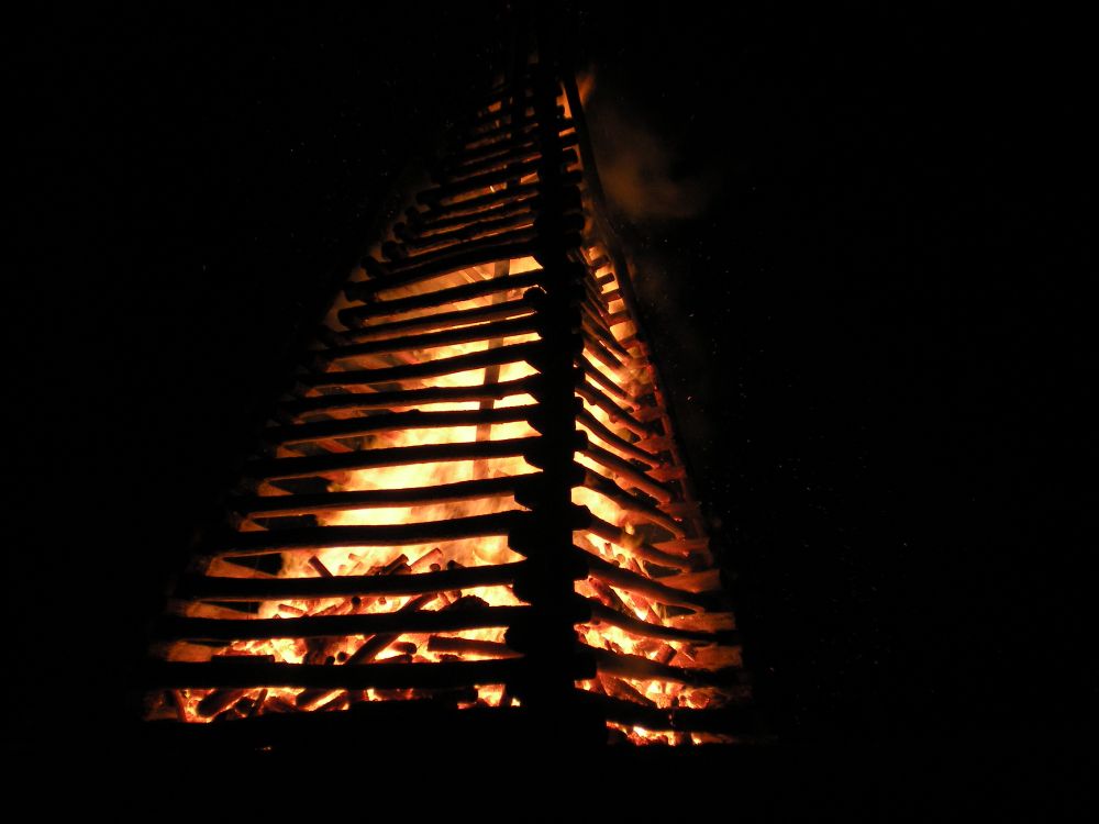 Bonfire glowing and burning out.