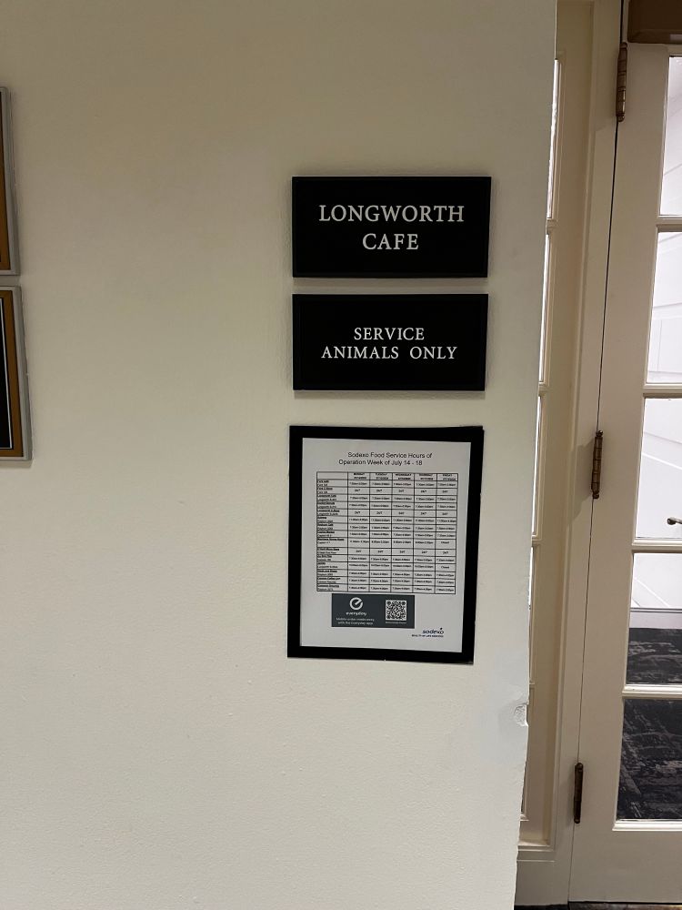 Sign on door reads “Longworth Cafe. Service Animals Only”