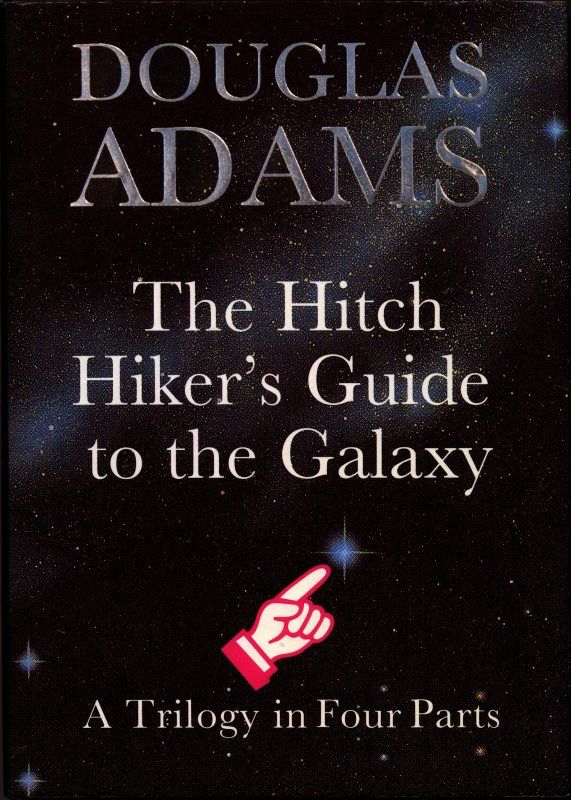 This is the cover of the book The Hitch Hiker’s Guide to the Galaxy by Douglas Adams. The background is a starry sky, and the title appears in large, bold text. Below the title, it reads “A Trilogy in Four Parts” There is a pointing hand icon bringing attention to a blue tinged star.