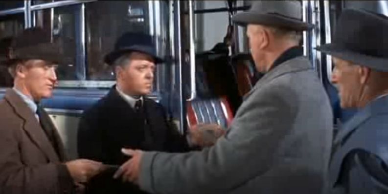 From the film, 'The Great Escape'.
Our plucky Brits have their papers checked by the SS whilst trying to board a bus
