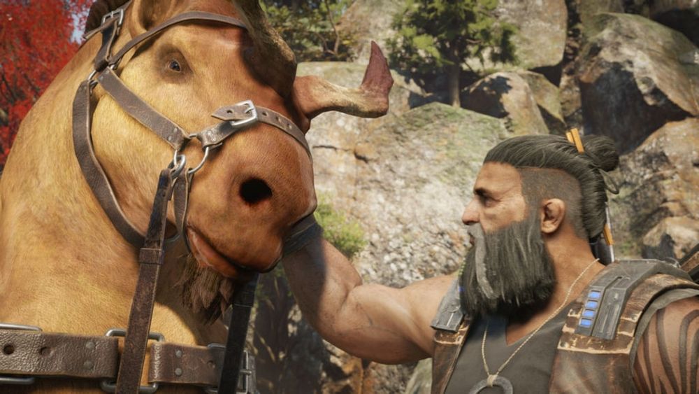Beefy Seran horse from Gears of War, next to his human handler.