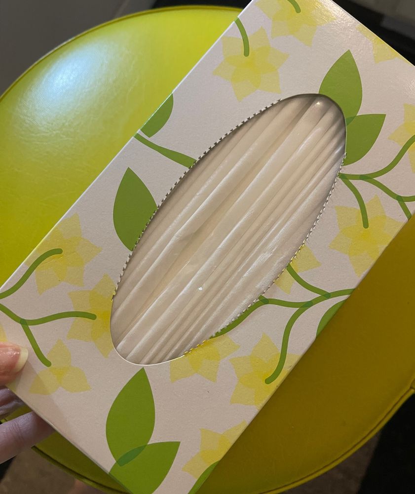 Yellow box of generic tissues.