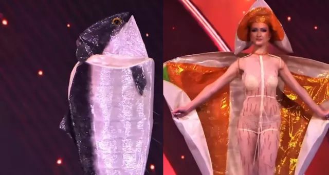 Miss Norway wearing a giant salmon costume then opening the skin to show herself as the meat/bones/roe inside.