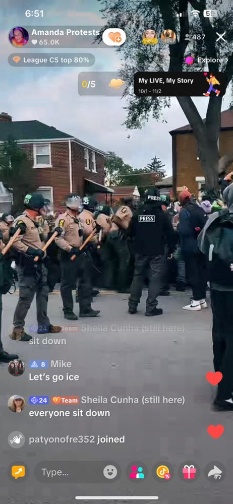 A line of riot gear police with clubs advances on protesters in a “designated free-speech area” near Broadview, Illinois ice facility