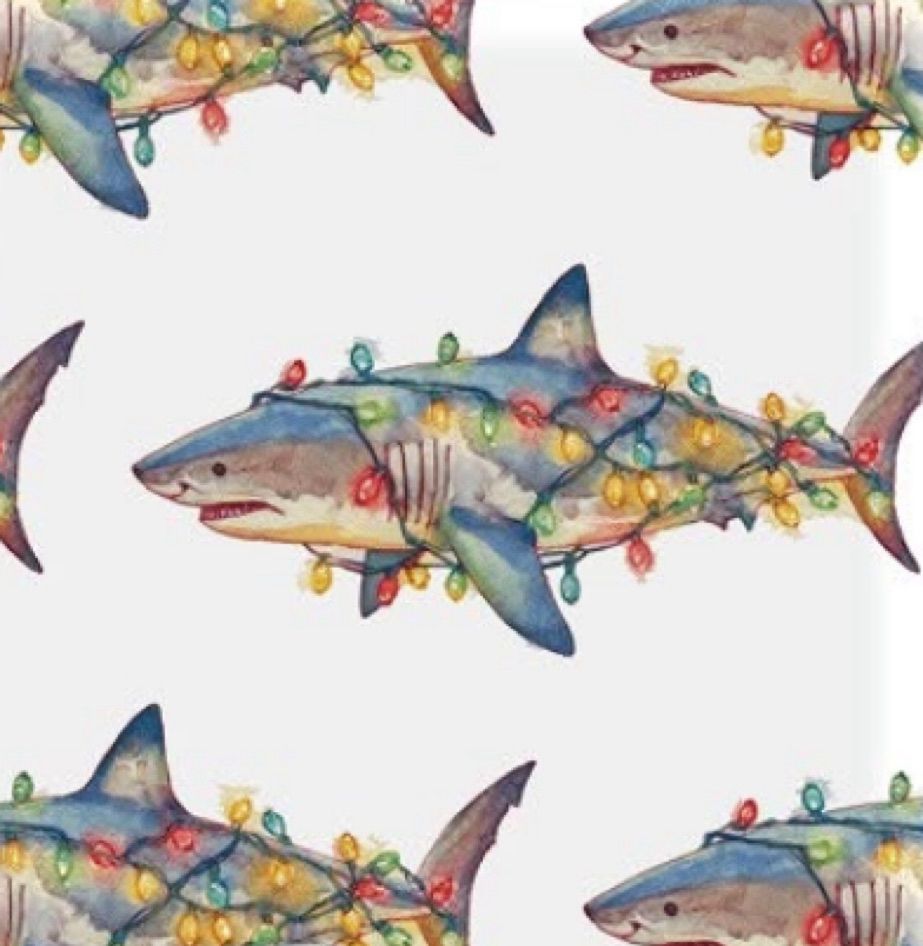 Image of sharks wrapped in holiday lights 