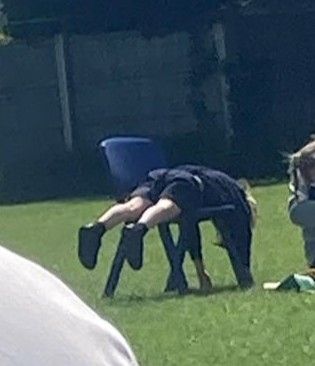 Tiny boy exhausted after single race. Flops out over chair