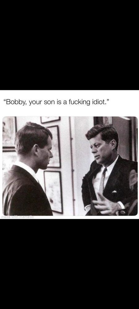 Old photo of JFK talking to RFK.