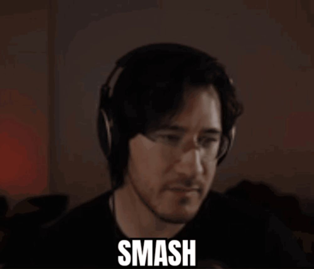 a close up of a man 's face with glasses and the word smash written on it .