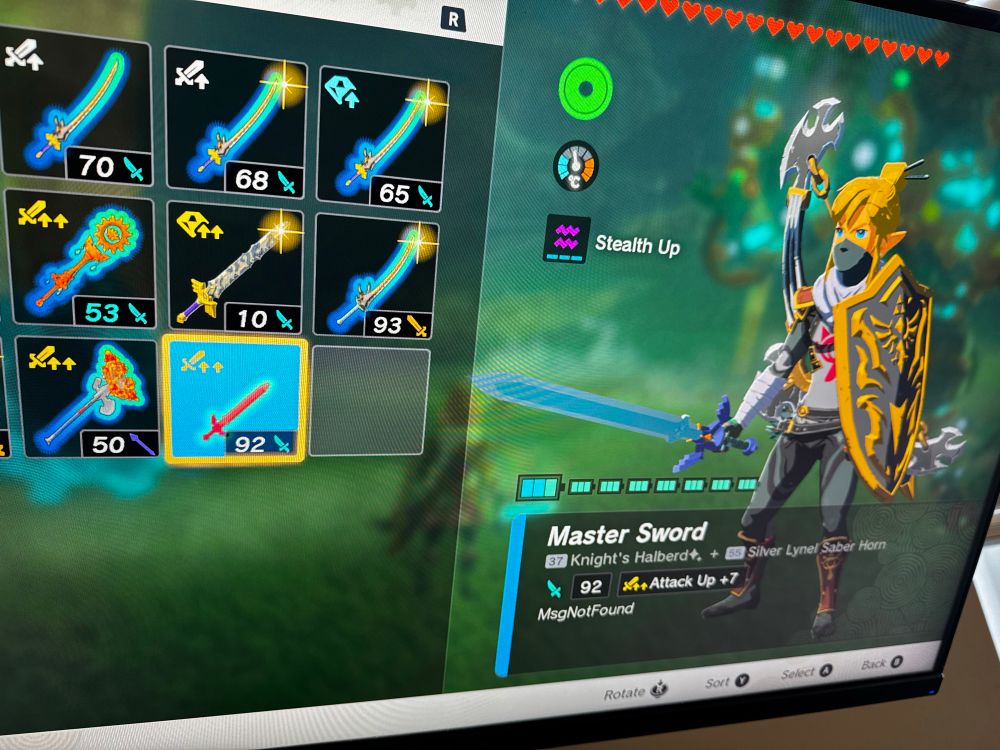 An unlimited durability master sword with a silver lynel horn fused to it, the description of the sword reads MsgNotFound.