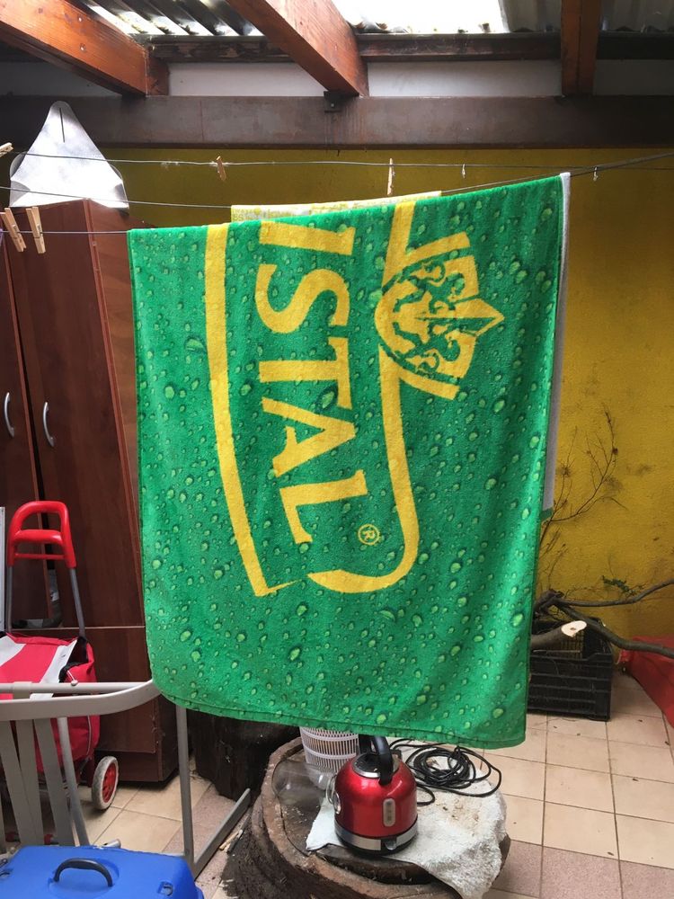 CERVEZA CRISTAL towel hanging on a garage