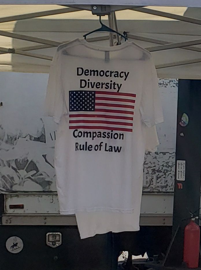 T-shirt for sale saying
Democracy
Diversity
U.s. flag image
Compassion
Rule of law