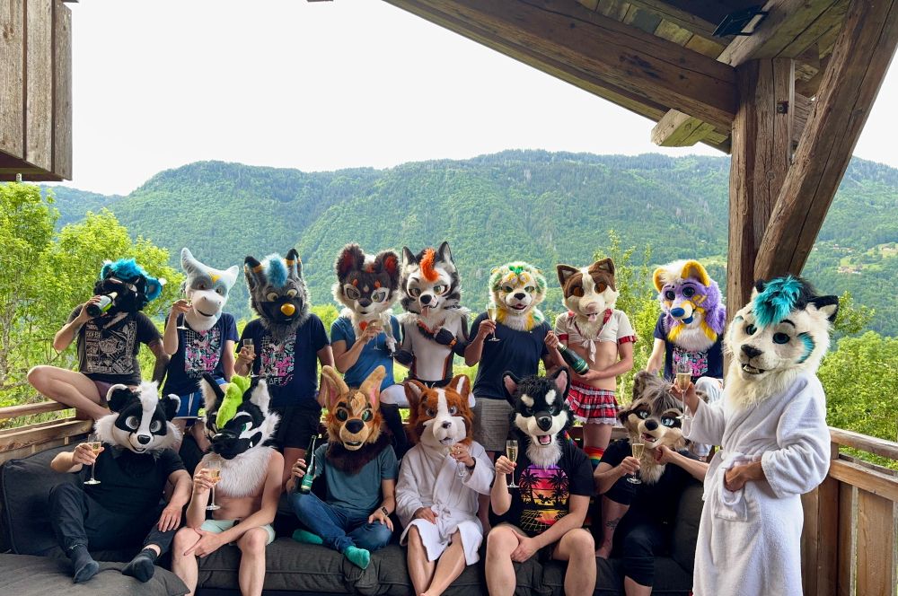 A bunch of fursuiter, raising champagne glasses.