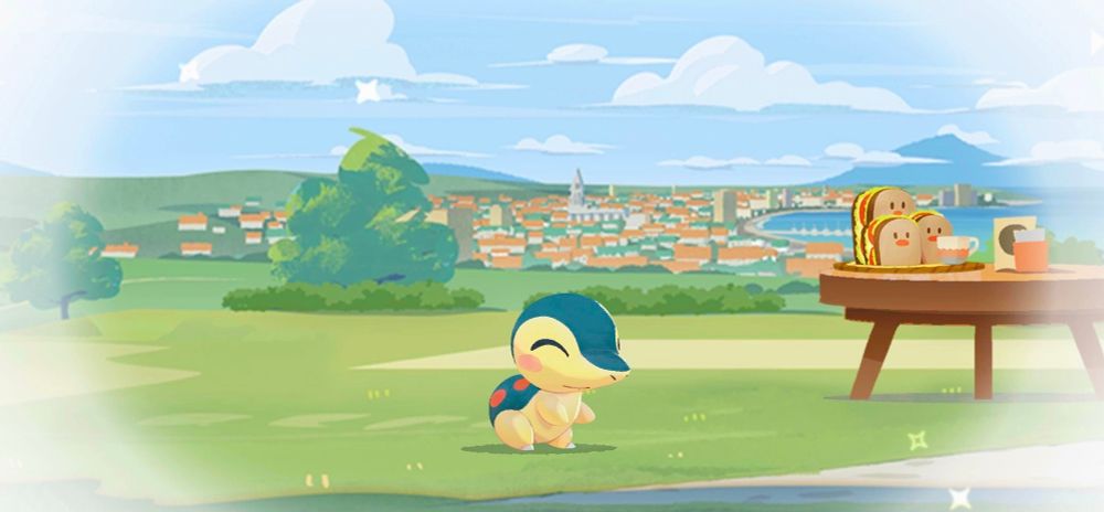 Cyndaquil from Pokémon Café in the middle of a park.