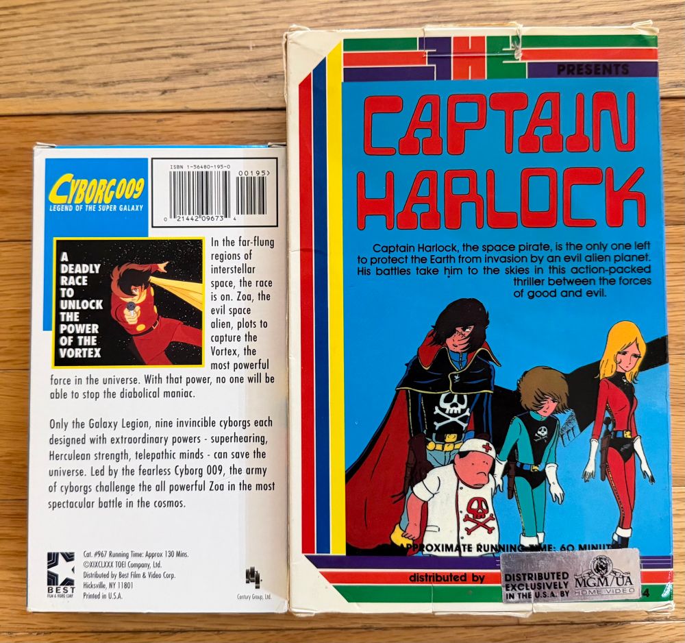 Backs of the tapes, showing a clumsily applied Distributed by MGM/UA sticker on the back