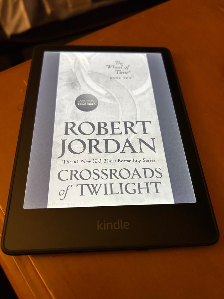 Pic of a kindle with Robert Jordan’s Crossroads of Twilight 