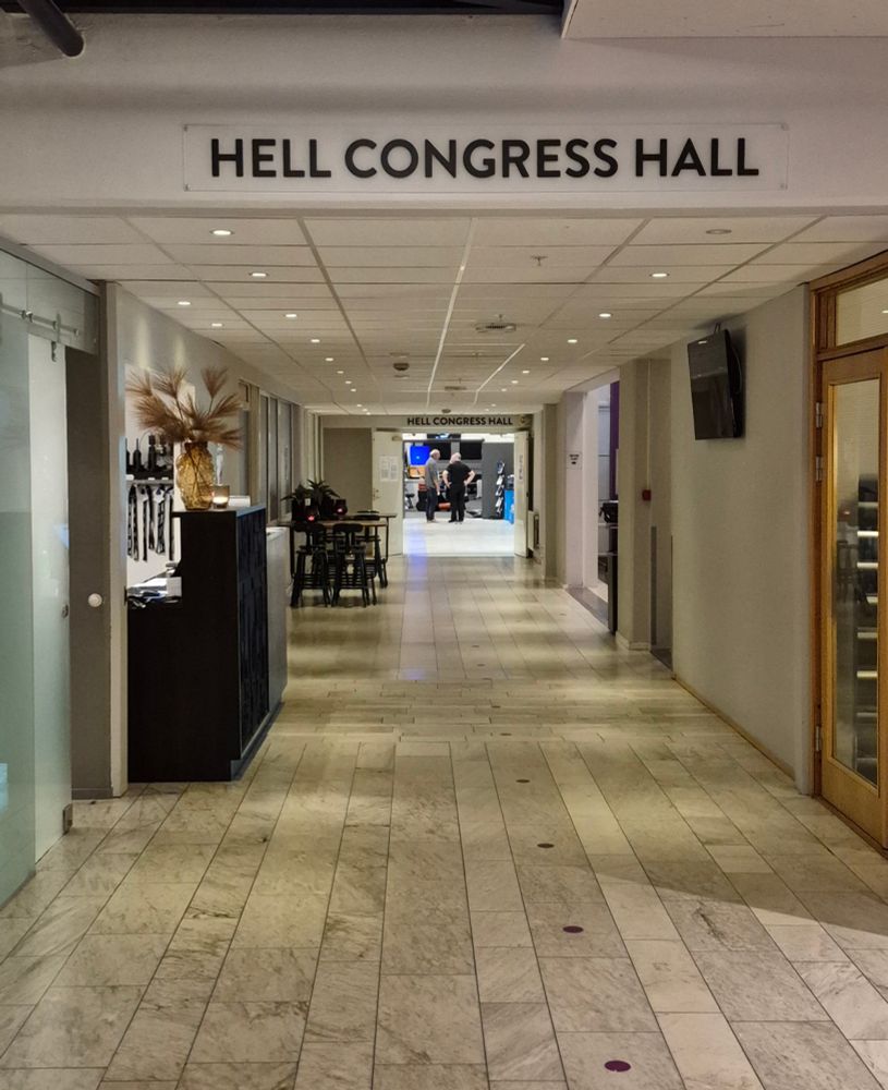 Photo of hallway with text indicating direction: "Hell Congress Hall". Taken in the lobby of Scandic Hotel Hell, Norway. 