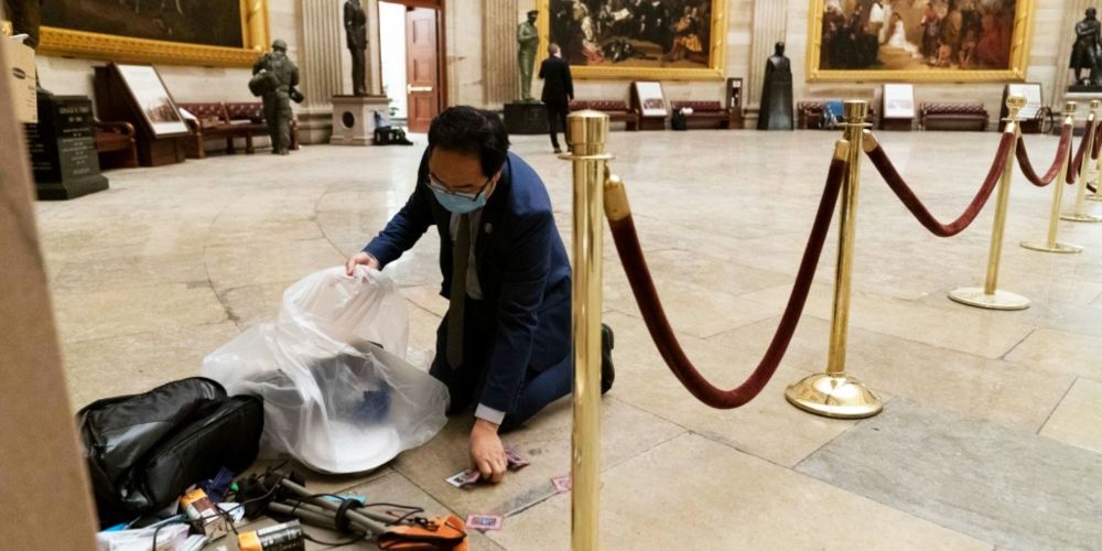 Behind the viral photo of Rep. Andy Kim cleaning up at midnight after riots