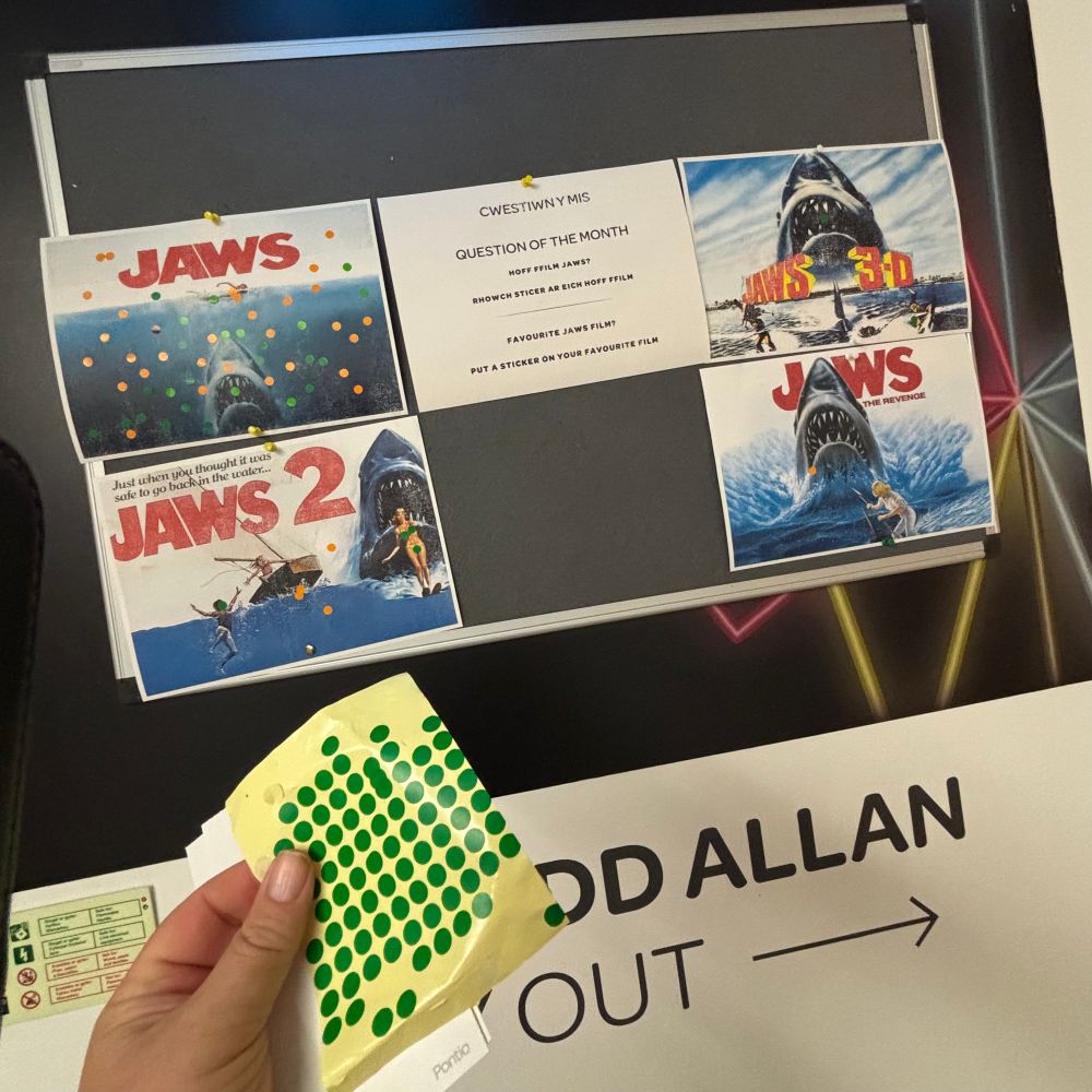 Jaws posters with stickers denoting people’s favourite- original Jaws has many stickers, Jaws 2 has 4 and jaws3D and jaws the revenge have one each!