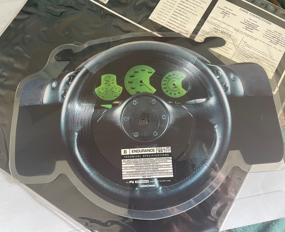 Cars picture disc in shape of car with dashboard