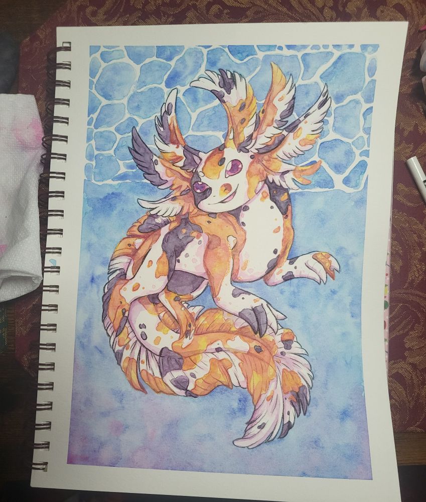 A koi inspired axolotl designed by me and painted with watercolor.  While also being lined with colored pencils. 
