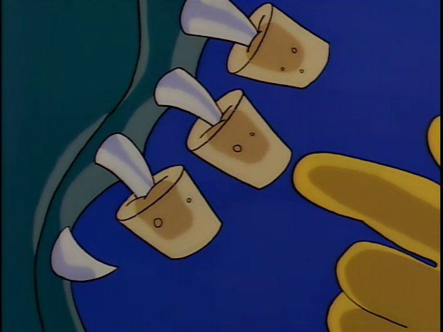 A drawing of a row of gator teeth with corks on them, with a yellow Simpsons hand pointing at them