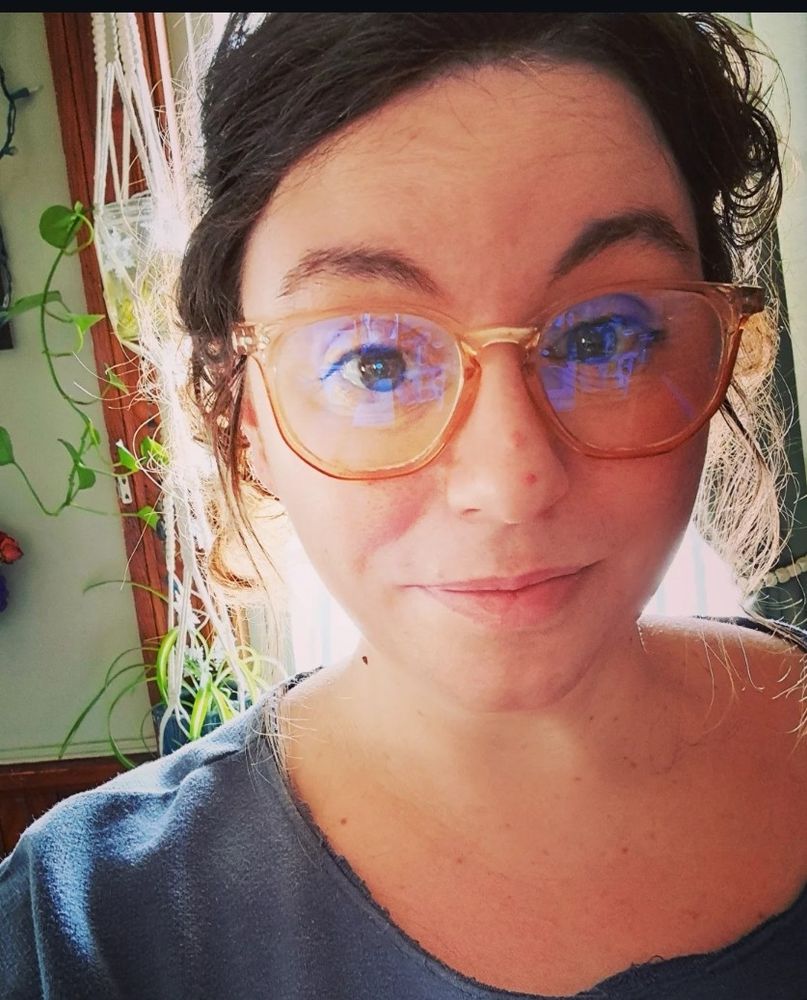A selfie of me in front of a sunlit window 