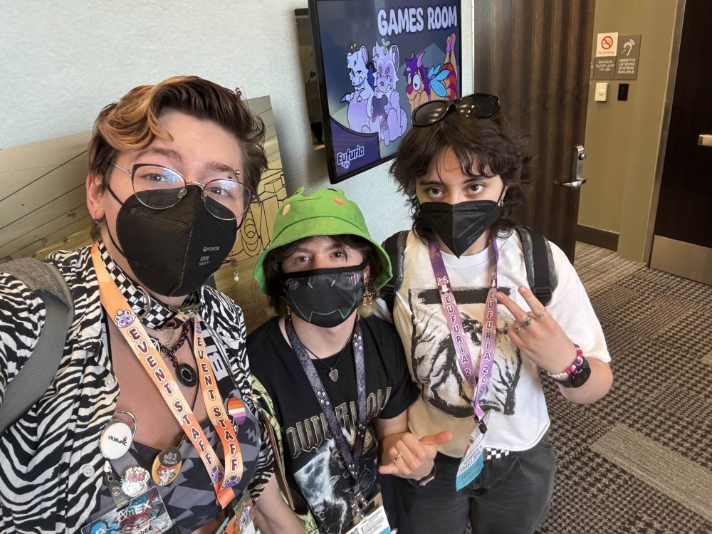 a pic of me and my buddies sam and sarah in front of the eufuria games room sign