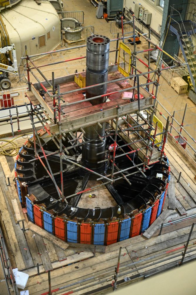 A turbine (casing removed) undergoing maintenance by the ESB in the original turbine building at Ardnacrusha (photo: M. O'Connell, 2025-07-04)