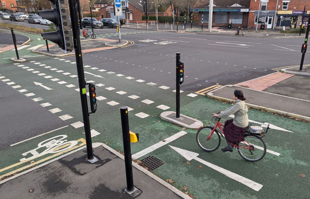 Woman cycling on a new Cyclops junction 