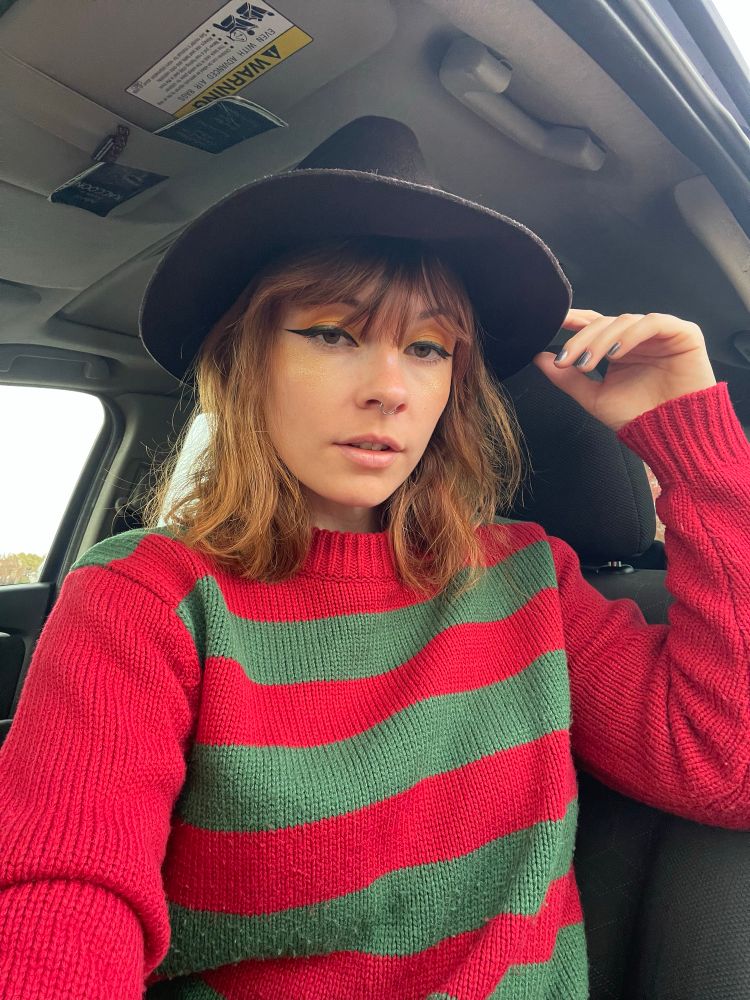 Same cute red head in a Freddy Krueger costume 