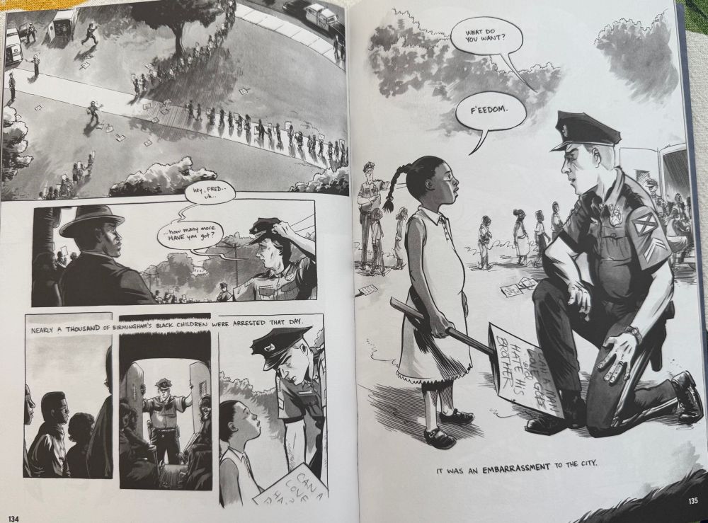 Page from March, book 2, shows children’s march being stopped by police