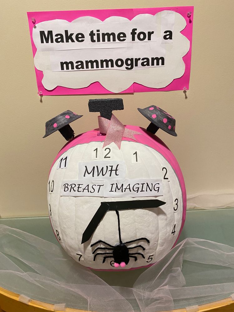 Pumpkin decorated as a clock reminding women to make time for a mammogram
