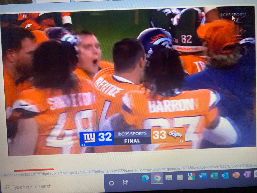 Denver Broncos celebrate after they pull off the comeback win against the New Jersey Giants