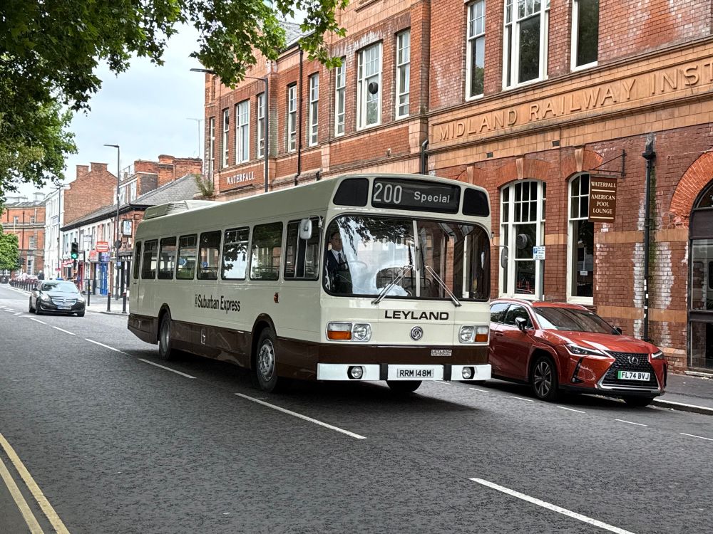 Leyland National single deck bus in brown and cream 