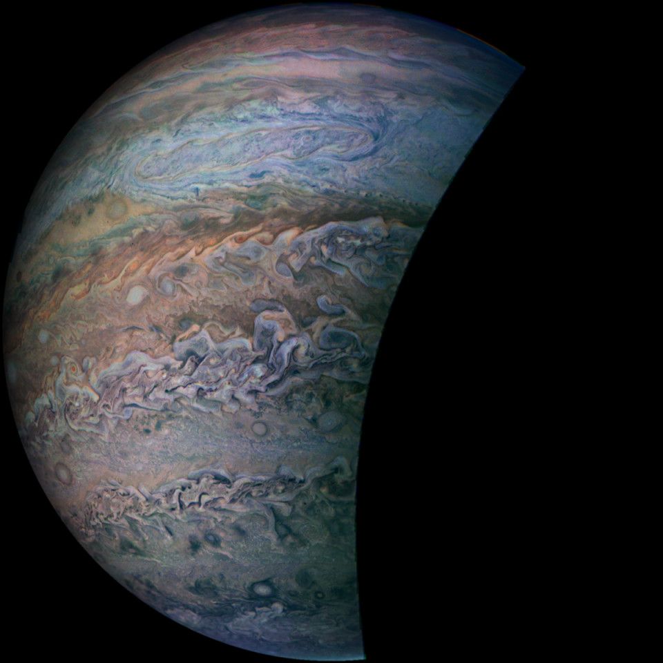 Image depicting Jupiter's southern hemisphere cloudtops, with multiple storm systems in various shapes, sizes and colours spread throughout the planet.