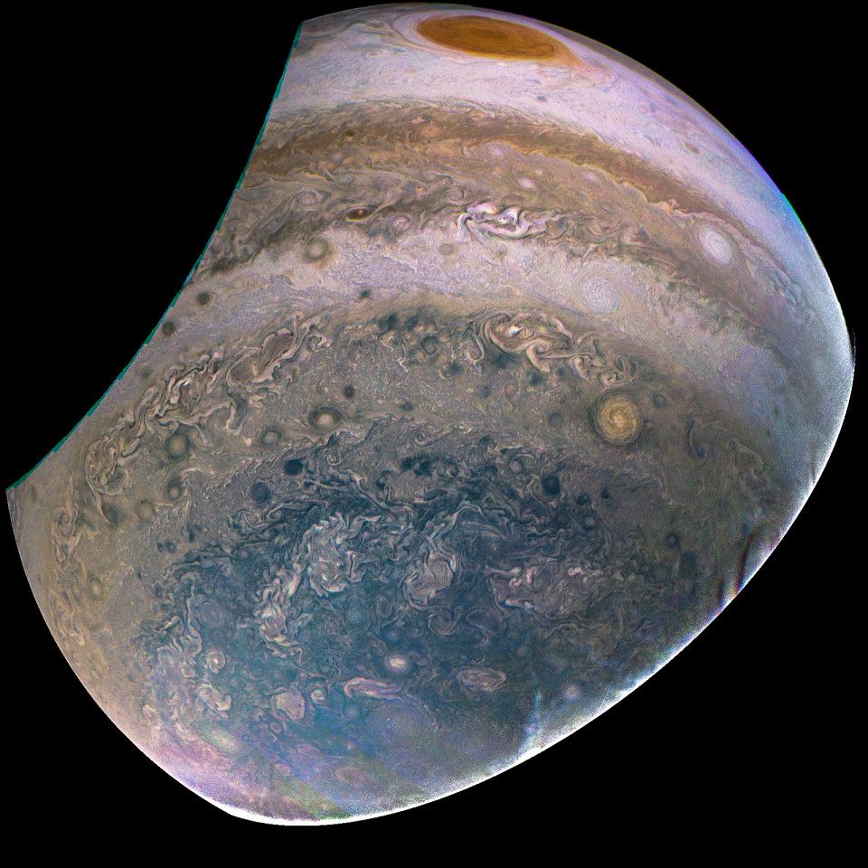 View of Jupiter's southern hemisphere, showing its polar hood, some cloud bands and the Great Red Spot, a massive anticyclone.