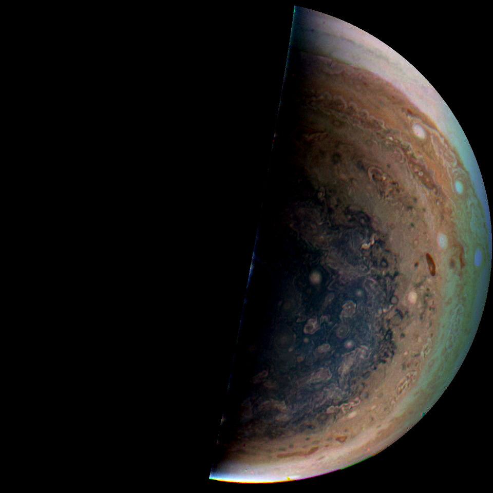 Photo of Jupiter's southernmost latitudes, centred near the south pole. Countless storms can be seen throughout the visible area.