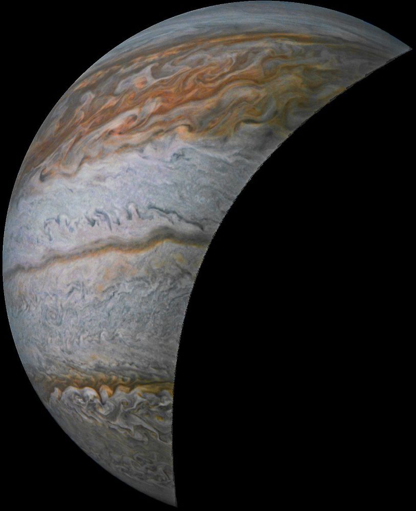 Photo of Jupiter, displaying some of its cloud bands. Lots of turbulent flow can be seen through the various clouds and storms.