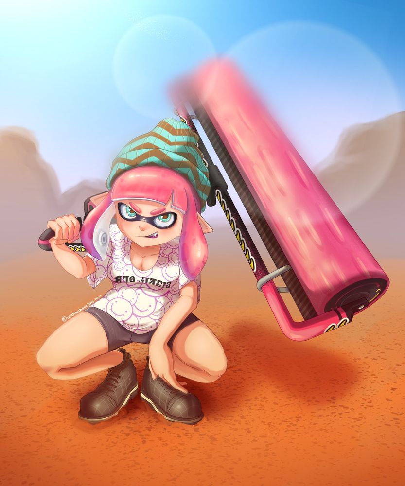 In a desertic landscape, an inkling with pink hair, a beanie, some black shoes is crouching, resting on herself, smirking confidently at the camera while holding a carbon deco roller over her shoulder.