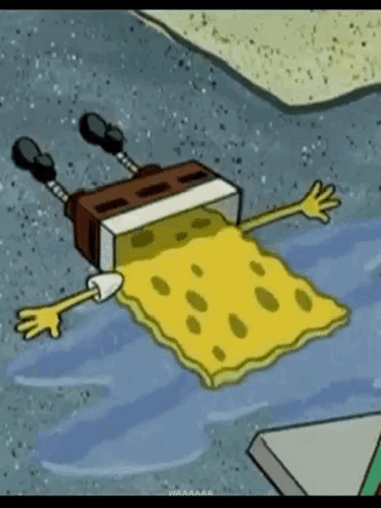 a spongebob squarepants cartoon character is laying on the ground in the water .