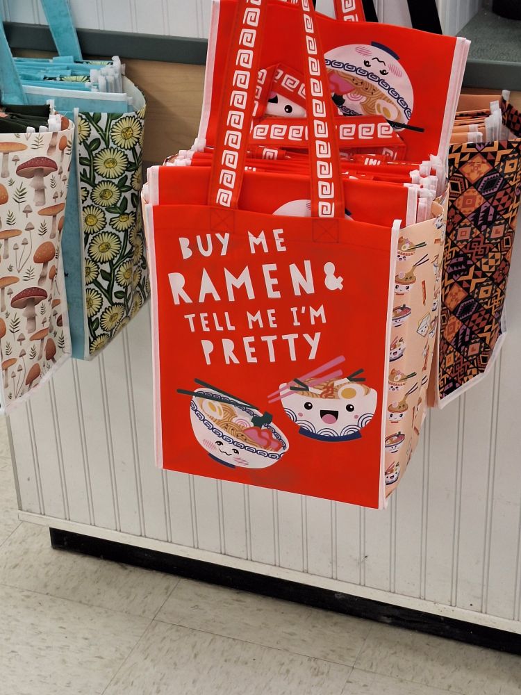 reusable shopping bag that says, "Buy me ramen and tell me I'm pretty."