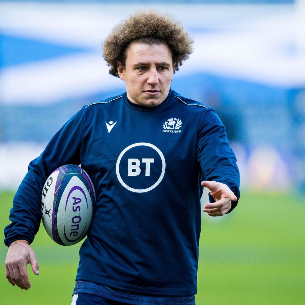 Arguabmy Scotland's greatest fly half and human being, Duncan Weir, rugby ball under his right arm, left hand pointing the way to the future