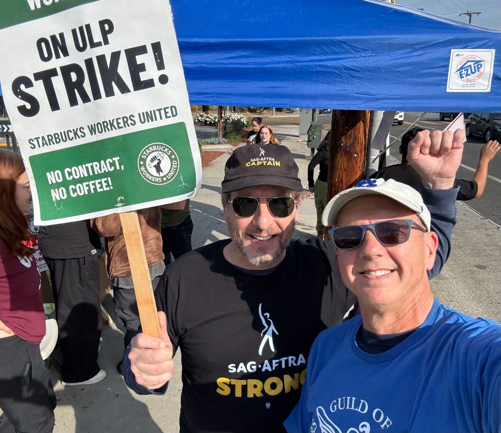 Jefrey Reeves and Mike Royce on a Starbucks picket line near downtown Los Angeles