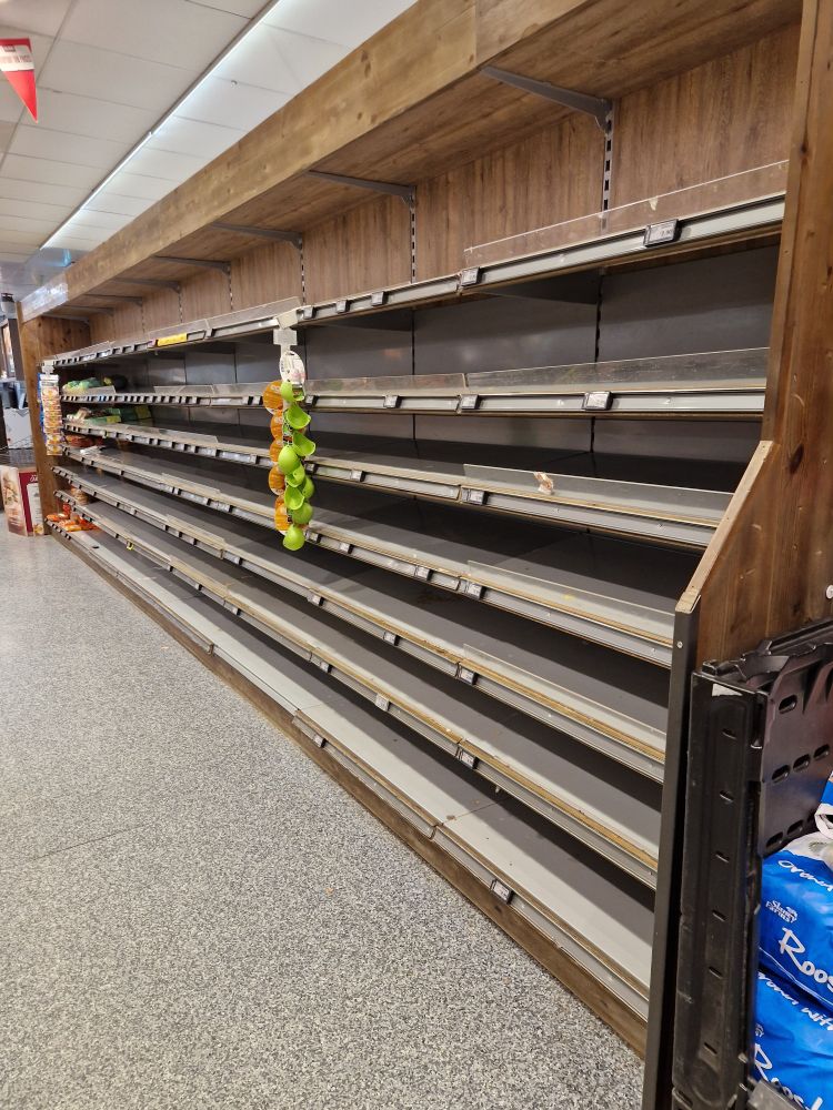 Empty shelves in an Irish supermarket, where there was once bread. There must be a weather warning in place.