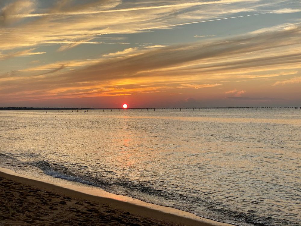 Sunset over water, August 28, 2022. This was taken about four hours after my mom passed away. 