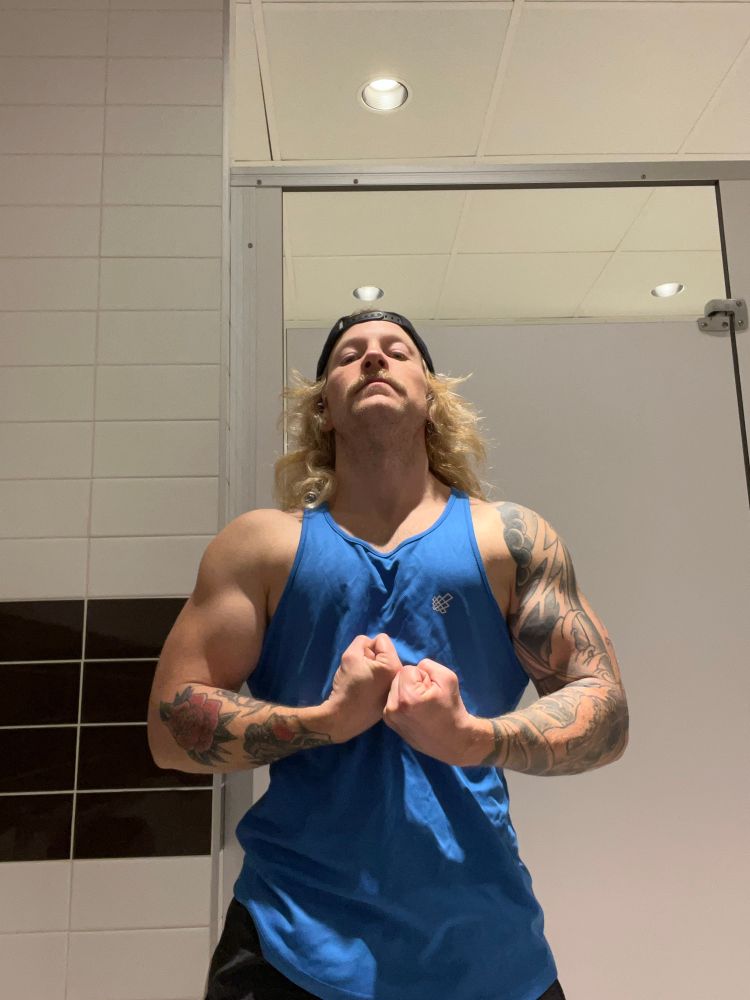Gym bro giving a big flex