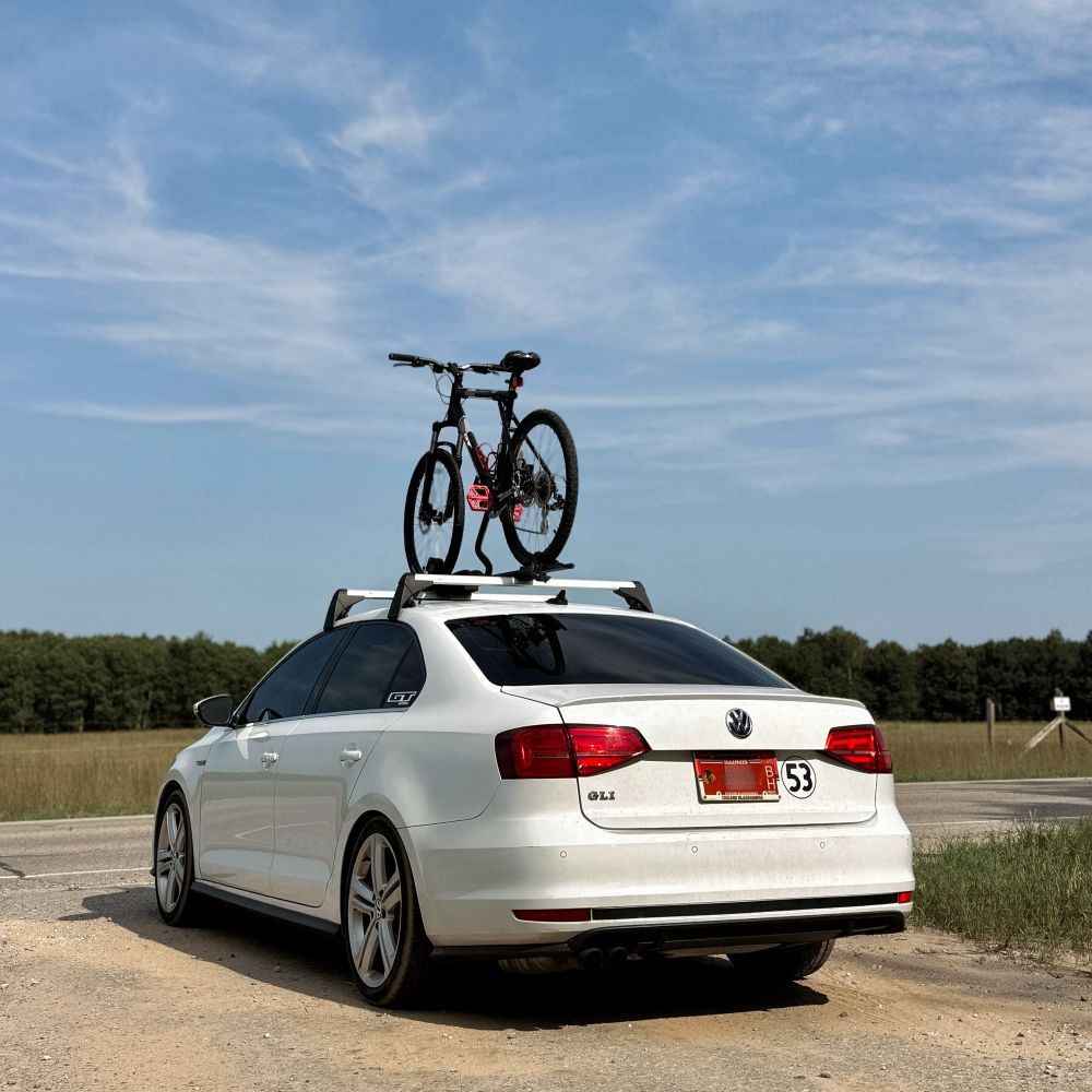 Volkswagen Jetta GLI with a roof-mounted bike rack