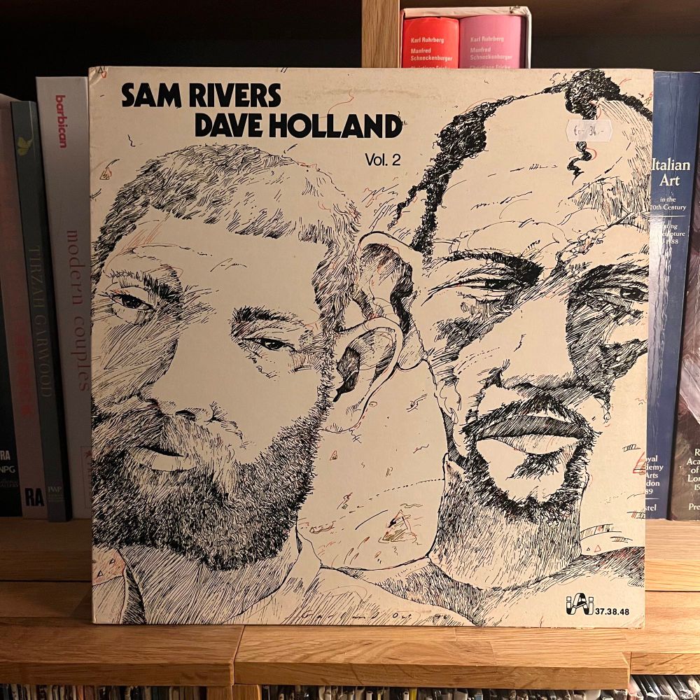 Some Rivers and Dave Holland volume two. The sleeve features caricature style pencil drawings of the Two artists.
