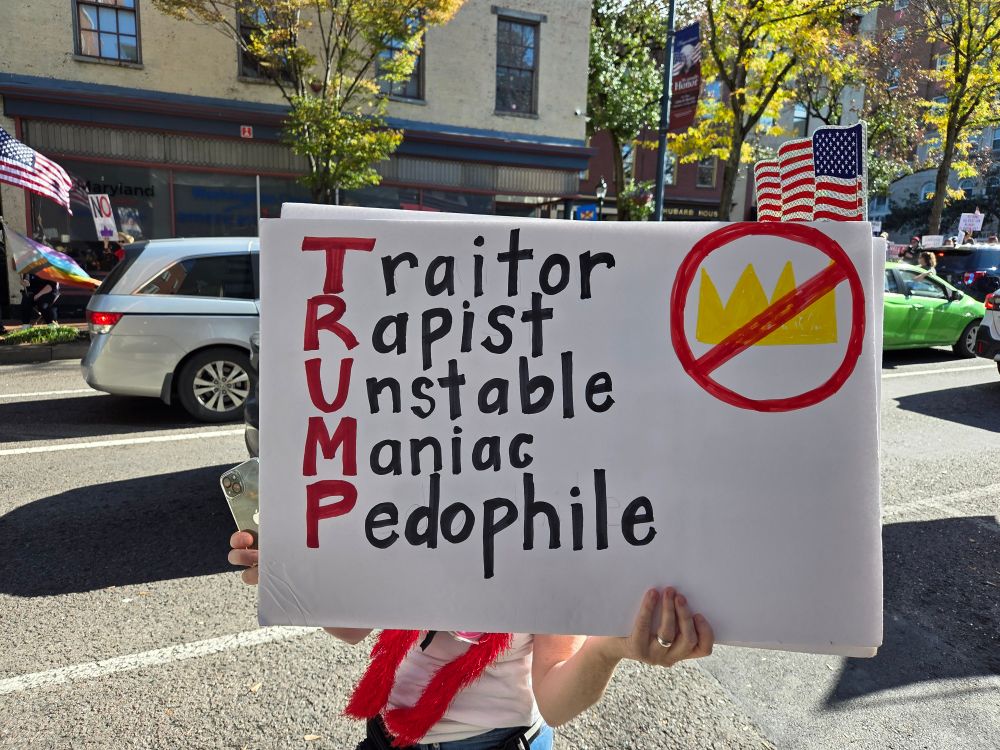Traitor Rapist Unstable Maniac Pedophile sign at Hagerstown No Kings